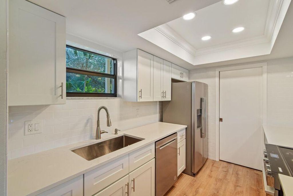 Photo of 11863 Wimbledon Circle #509, Wellington, FL 33414 (MLS # B26010618)