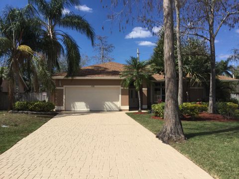 Photo of 103 Oxford Court, Royal Palm Beach, FL 33411 (MLS # B26019971)