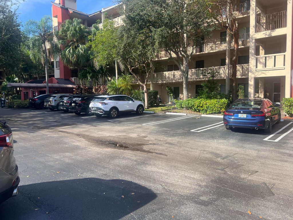 Photo of 2208 S Cypress Bend Drive #106, Pompano Beach, FL 33069 (MLS # R11147350)