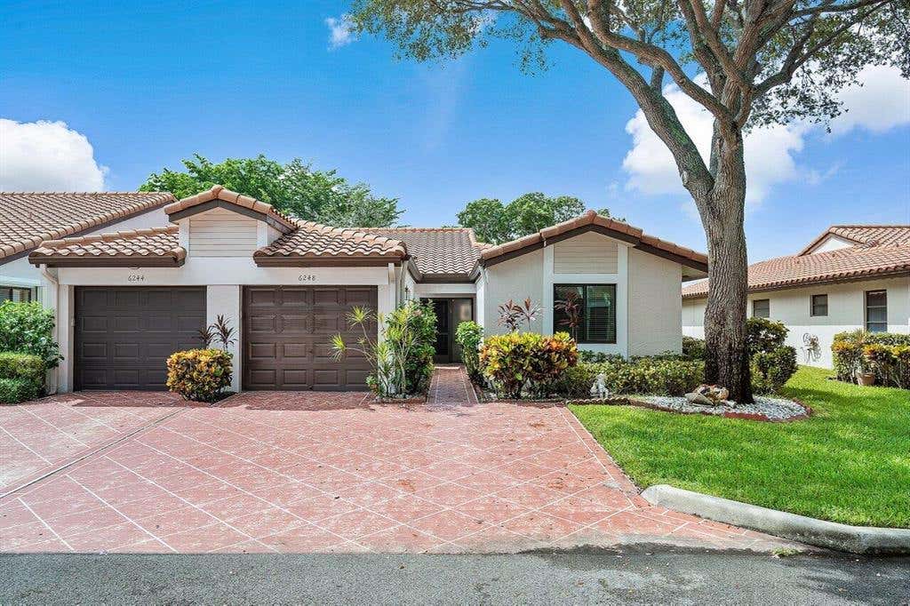 Photo of 6248 Kings Gate Circle Cir, Delray Beach, FL 33484 (MLS # R10833933)