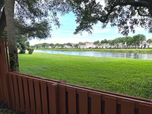WHAT A VIEW FROM THIS COURTYARD TOWN HOME. STUNNING LAKE VIEW FROM EVERY ROOM IN THE HOUSE. THIS GEM BOASTS A NEW UPDATED 2ND BATHROOM, MASTER BATH WITH STEP IN SHOWER, ALSO UPDATED, MAIN FLOOR GUEST HALF BATH VANITY, UPDATED. REFRIGERATOR, RANGE NEW. 2 BEDROOMS UPSTAIRS: MASTER HAS AN ENSUITE WITH DOUBLE SINKS AND GENEROUS WALK IN CLOSET. GALLEY STYLE KITCHEN AND GENEROUS LIVING AREA EACH HAVE SLIDING DOOR ACCESS TO THE FENCED PRIVATE COURTYARD. AND LIVING AREA. A WASHER/DRYER ON THE MAIN FLOOR IN GUEST BATH AREA. THE OPEN, VERSATILE MAIN FLOOR LAYOUT WITH SLEEPING QUARTERS UPSTAIRS MAKES IT IDEAL FOR THE FLORIDA LIFESTYLE YOU ARE LOOKING FOR., NON SMOKERS ONLY AND SMALL PET CONSIDERED. CLOSE TO SHOPPING, I95 & DELRAY BEACH. THIS PROPERTY IS A TRUE GEM WITH A VIEW.