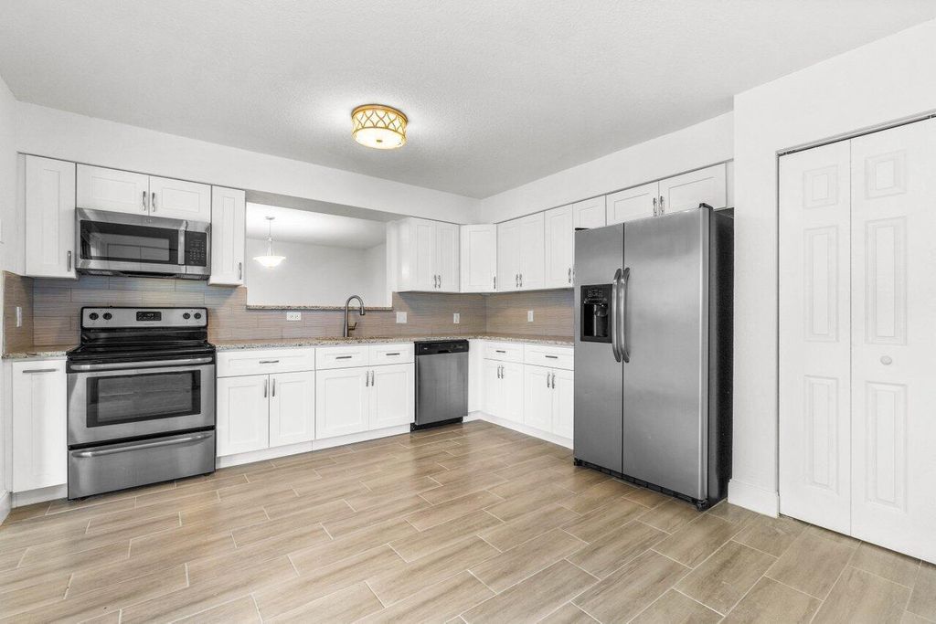 Photo of 2030 Colonial Road #6, Fort Pierce, FL 34950 (MLS # R10950622)