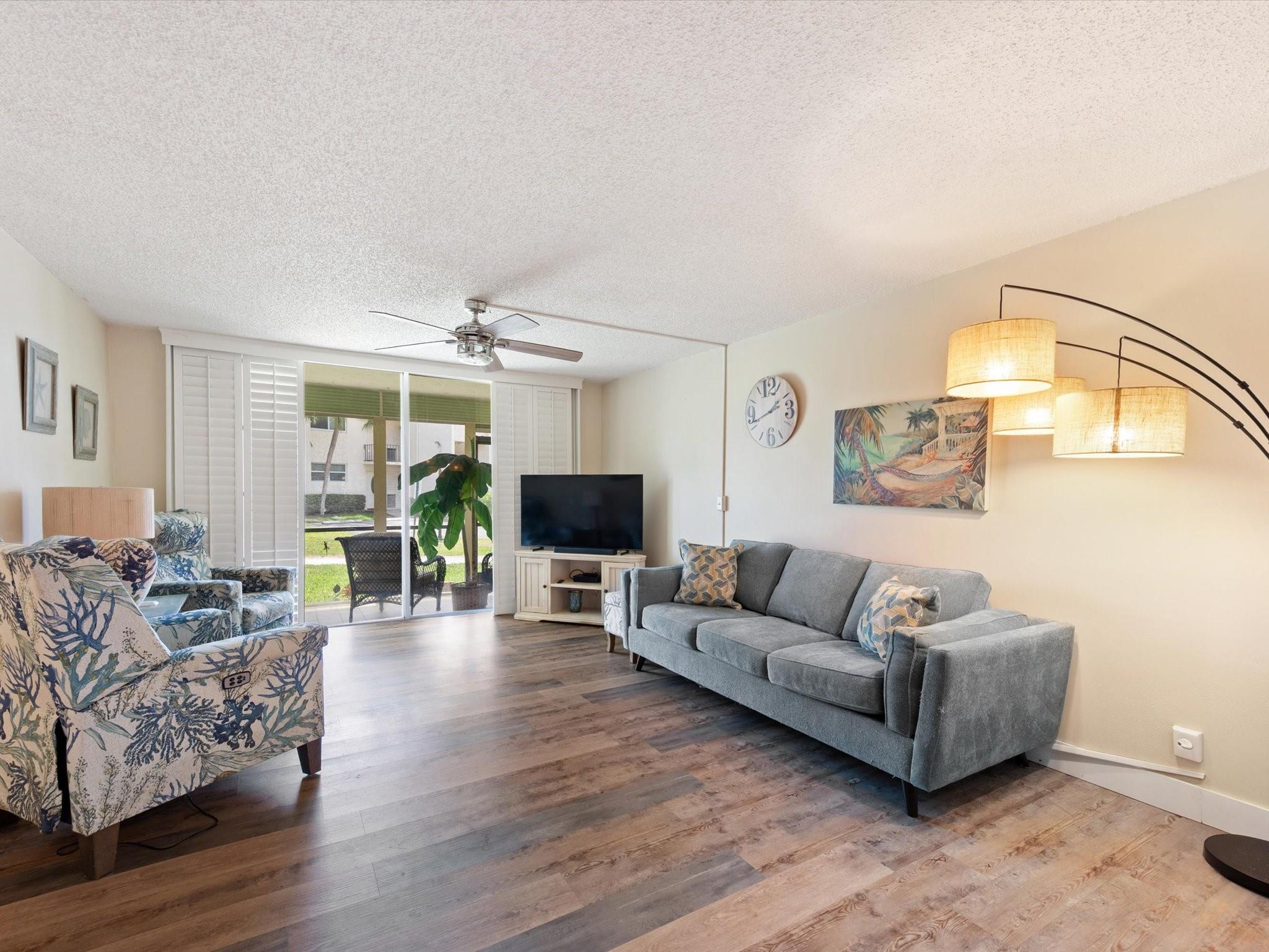 Own your own condo in the RESORT LIKE community of HOLLYBROOK and even bring your family PET less than 20 lbs! This 2/2 unit has newer stainless steel appliances, kitchen changing color lighting, Plantation Shutters through out and the floors are waterproof vinyl stain resistant & Pet Friendly. A 5 year warranty is in place for a new air conditioner installed May, 2022. There is also the convenience of a portable WASHER inside the unit! Have fun in Hollybrook! Residents golf FREE paying only for cart. There is Tennis, Pickleball, Bocce Ball, Fitness Center, Billiards, Library, Clubs, Club House, UV Charging Station and much more! Water, Cable & Internet are included in the maintenance. The community is GUARD GATED & has a RESTAURANT on site. Check AGE, INCOME & CREDIT requirements. RLP