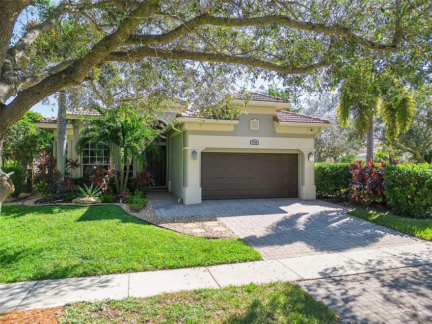 Turn-key move in tomorrow, Spectacular corner 3/2.5 pool home in Heron Cove, Heron Bay, This home has fabulous upgrades, new plank wood porcelain flooring, New white kitchen w/Uba granite countertops & new bathrooms, All newer LG stainless appliances, newer washer/dryer, newer A/C with UV Germ light/wifi thermostat, Smart home w/apps controlled by WIFI, The media closet= "cable chases" for extra fast & solid WIFI &  EV charging station, custom light fixtures & fans, newly painted inside & out, Wired camera security throughout exterior, custom closets, Tray ceiling with LED & custom smart lighting, custom window treatments, $120k heated salt water pool w spa inside the actual pool with seating shelf for 6 guests, LED pool lighting, Tesla garage charger, see attached upgrade sheet, A+schools