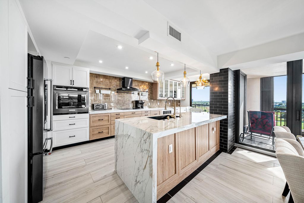 Photo of 2427 Presidential Way #802, West Palm Beach, FL 33401 (MLS # R11145837)