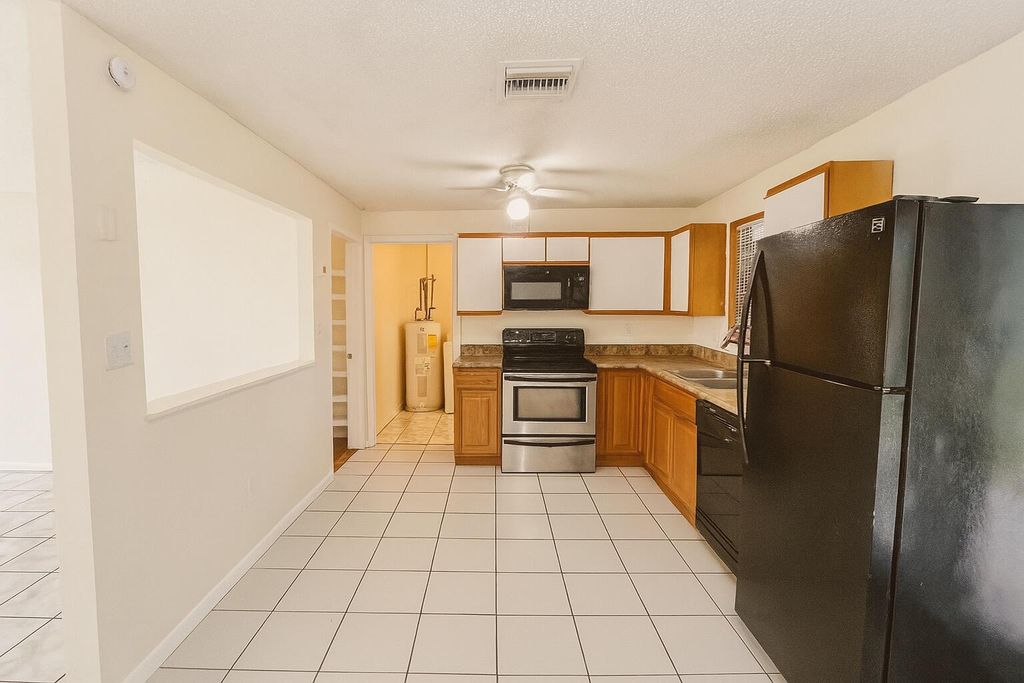 Photo of 3313 Plaza Place, Lake Worth, FL 33462 (MLS # R11106607)
