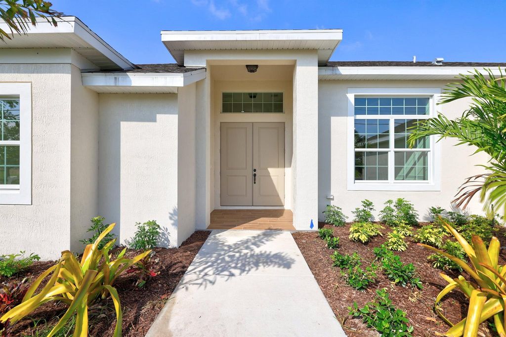 Photo of 3239 SE Pinto Street, Port Saint Lucie, FL 34984 (MLS # R10878540)