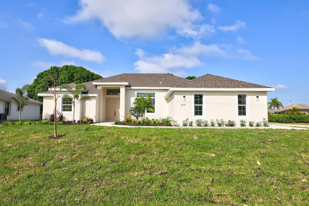 Photo of 3239 SE Pinto Street, Port Saint Lucie, FL 34984 (MLS # R10878540)