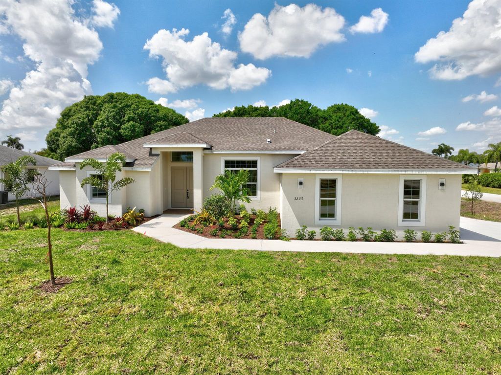 Photo of 3239 SE Pinto Street, Port Saint Lucie, FL 34984 (MLS # R10878540)