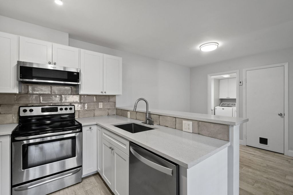 Photo of 1405 14th Terrace, Palm Beach Gardens, FL 33418 (MLS # R11048520)