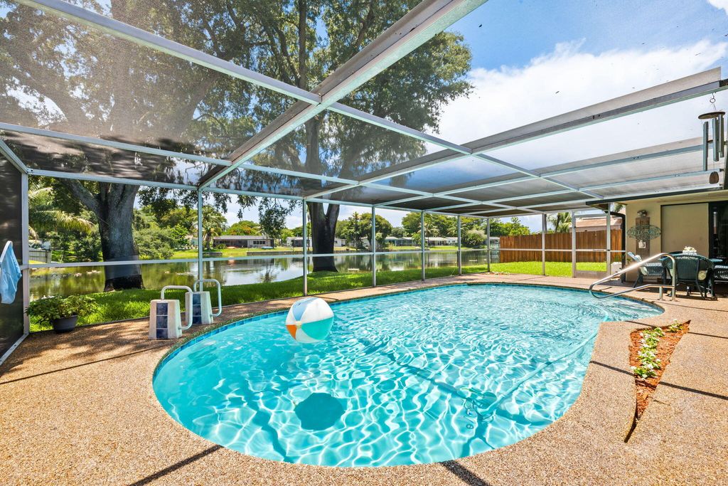 Photo of 1720 NW 105th Avenue, Pembroke Pines, FL 33026 (MLS # B26049982)