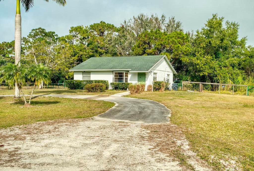 Photo of 13219 41st Lane N, The Acreage, FL 33411 (MLS # R11152001)