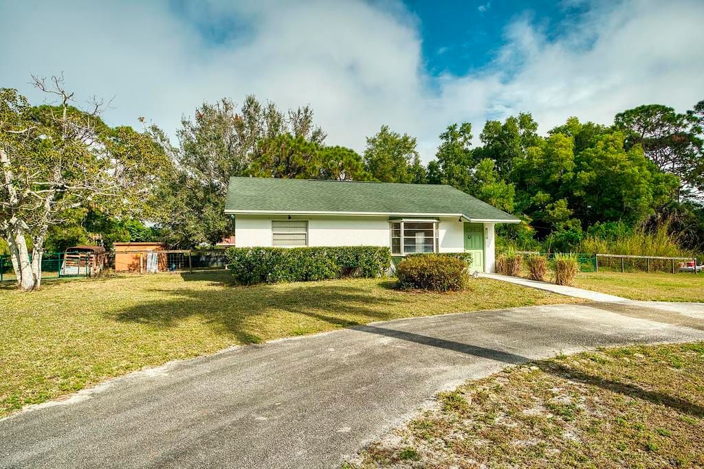 Photo of 13219 41st Lane N, The Acreage, FL 33411 (MLS # R11152001)