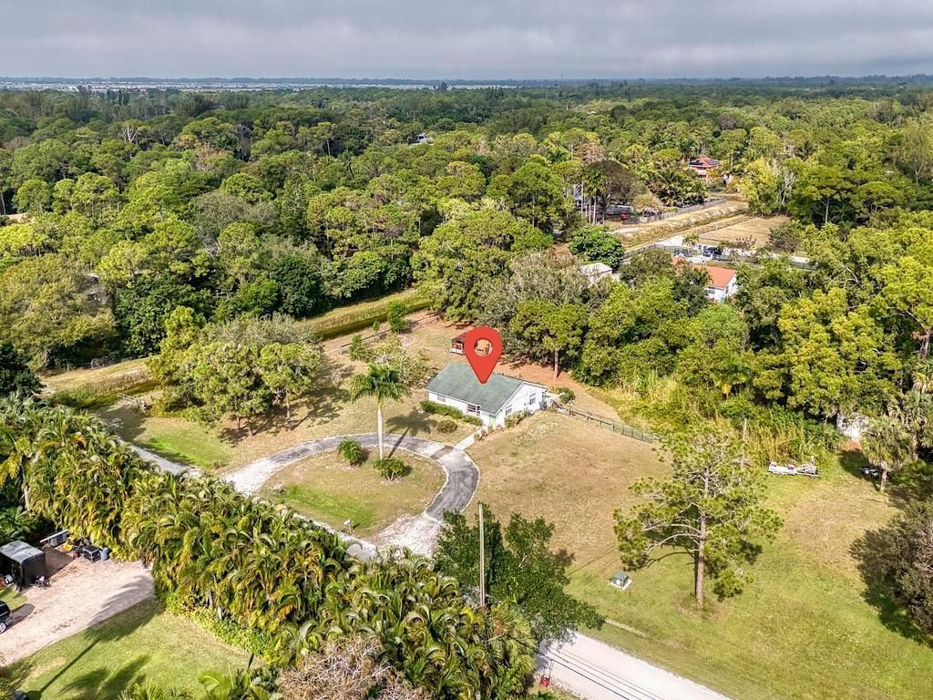 Photo of 13219 41st Lane N, The Acreage, FL 33411 (MLS # R11152001)