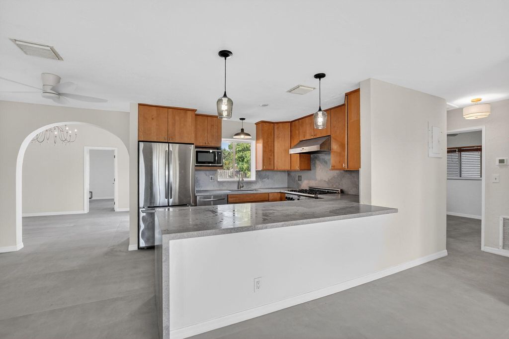 Photo of 467 NE 31st Street, Boca Raton, FL 33431 (MLS # B26008596)