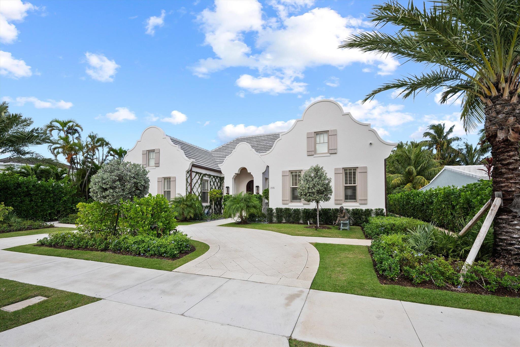 Stunning new construction that perfectly blends luxury and comfort. This impressive home features 5 spacious bedrooms and 5 beautifully appointed baths and two 1/2 baths, making it ideal for both family living and entertaining. Upon entering, you'll be greeted by elegant wood floors that flow throughout the home, complemented by soaring volume wood ceilings adorned with striking wood beams. The open kitchen, dining, and family room layout creates the most inviting, user friendly atmosphere.. Culinary enthusiasts will appreciate the chef's kitchen, which boasts an oversized walk-in pantry, top-of-the-line Wolf appliances, exquisite quartz countertops, and custom cabinets that provide both style and functionality. The primary suite is a true sanctuary featuring a spacious custom