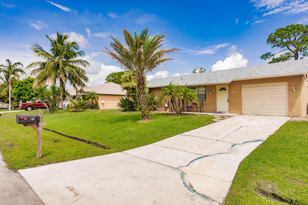 Photo of 761 SE Browning Avenue, Port Saint Lucie, FL 34983 (MLS # R11153517)