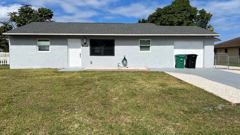 Photo of 1579 SE Minorca Avenue, Port St Lucie, FL 34952 (MLS # R11137314)