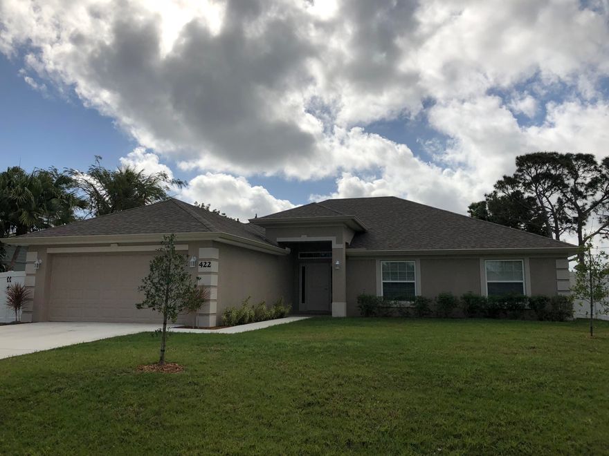 BUILT IN  2017 WITH SOME OUTSTANDING CUSTOM FEATURES. KITCHEN COMES WITH BEAUTIFUL WHITE WOOD SHAKER CROWN CABINETS WITH DUAL HANDLE NICKLE PLATED FINISH. NICKLE FINISHED MOEN FAUCETS THRU OUT HOME AND BATHS. OUTSIDE FEATURES A 56 FOOT LONG PORCH THAT IS TRUSSED ACROSS ENTIRE BACK OF HOME FOR OUTDOOR ENTERTAINING AND ENJOYMENT, AND A CUSTOM WHITE FIBERGLASS
FENCE ENCOMPASSES THE SIDE AND BACK YARD FOR PRIVACY ALSO. GARAGE WAS EXTENDED A EXTRA 2 FEET TO FIT LARGER TRUCKS/VEHICLES.NICE EARTH TONE COLORED TILE IN THE KITCHEN AND OTHER AREAS OF HOME. ALL APPLIANCES INCLUDING WASHER & DRYER, ALONG WITH A RECESSED WALK IN TILED SHOWER IN MASTER BATH . SUPERB LOCATION  NEAR THE NEW CROSSTOWN PARKWAY BRIDGE .  SHOWS LIKE A NEW MODEL.