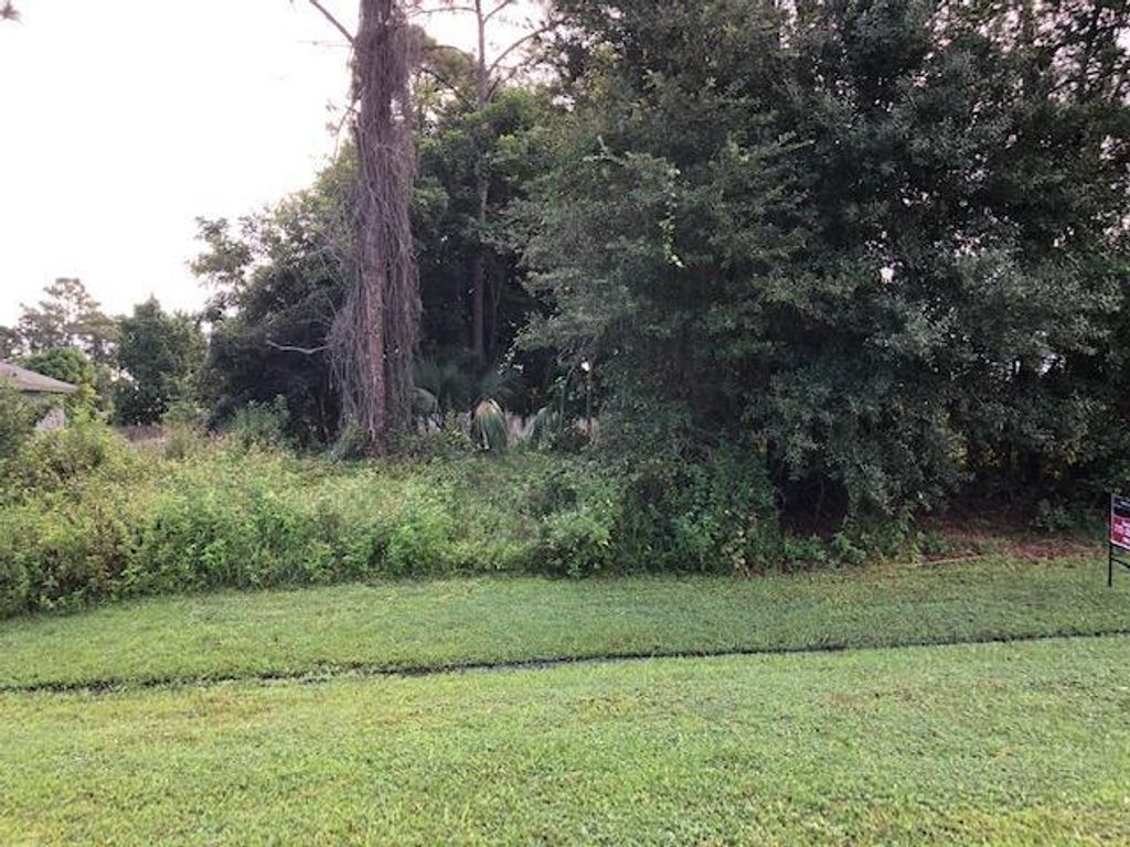 Photo of 3173 SW Savona Boulevard, Port Saint Lucie, FL 34953 (MLS # R10751493)