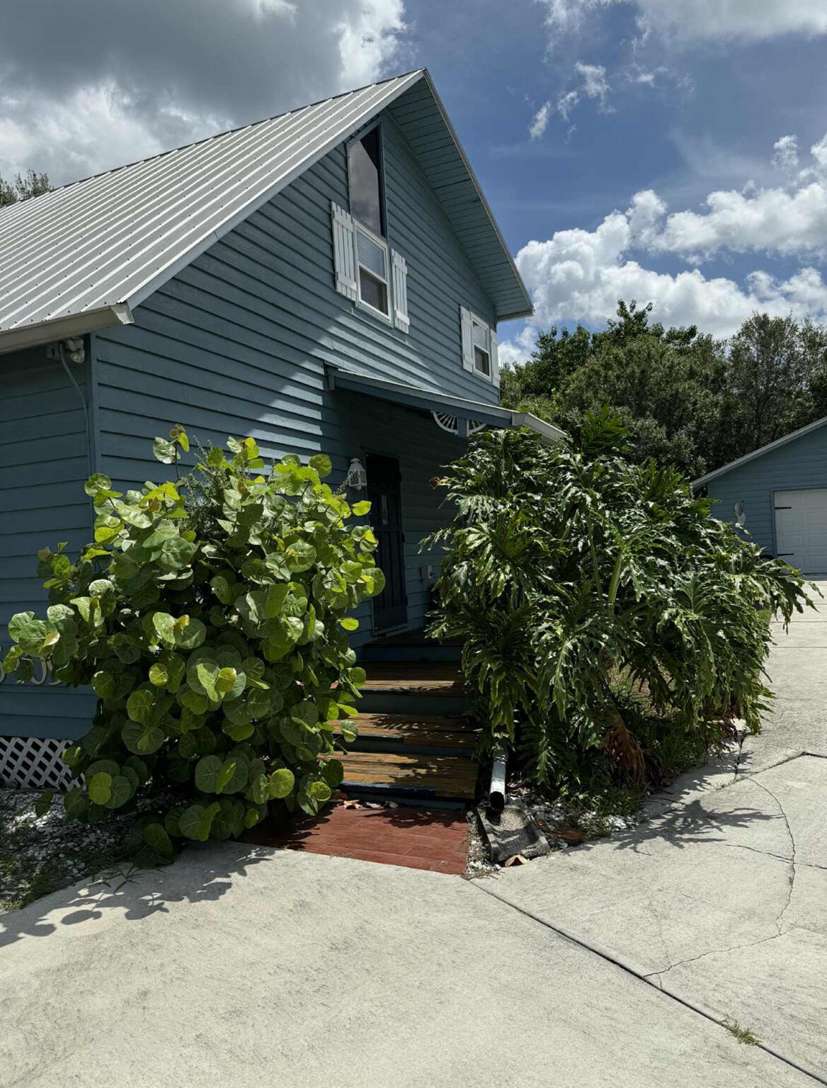 Situated in Indian River Estates, this gorgeous home is just minutes away from the beach and intracoastal waterway! Spacious 1/4 plus acre yard with large driveway and detached 2 car garage/workshop allows ample space for your boat and four wheel toys. Owner will reserve one bedroom and half of the garage space for personal storage (effectively 2 bed 2 bath to tenants).