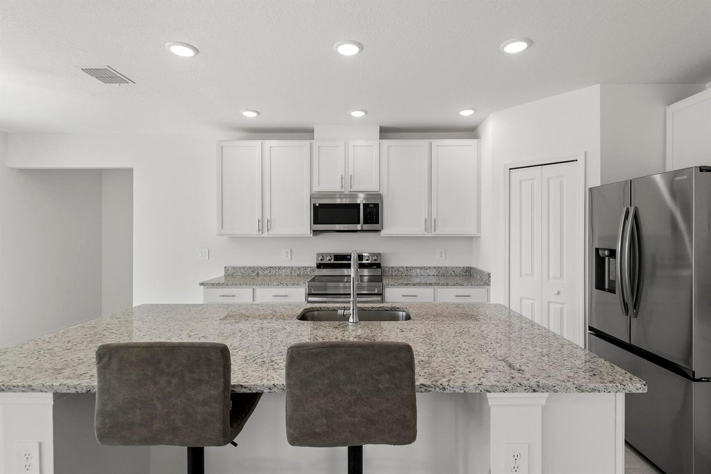 Photo of 12328 SW Forli Way, Port Saint Lucie, FL 34987 (MLS # R11071284)