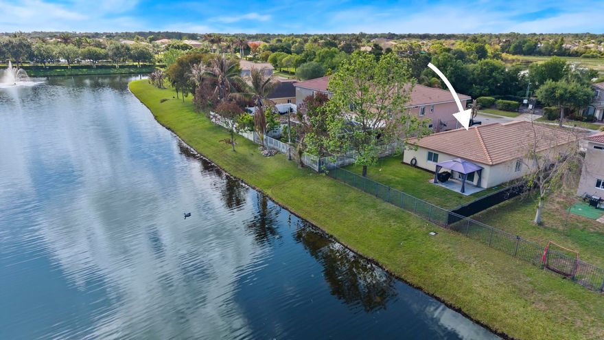 LAKESIDE Living at Its Best! Welcome to this beautifully maintained 4 bedroom, 2 bath home offering comfort, privacy, and scenic lakefront views. Nestled on a fully fenced lot, this property is perfect for enjoying outdoor living, pets, and added peace of mind. Inside, you'll find a spacious and functional layout ideal for both everyday living and entertaining. The home is equipped with a Halo whole house water filtration system, providing clean, purified water throughout. Wake up to tranquil lake views and unwind in your own private waterfront setting, all while enjoying the space and versatility this inviting home provides.