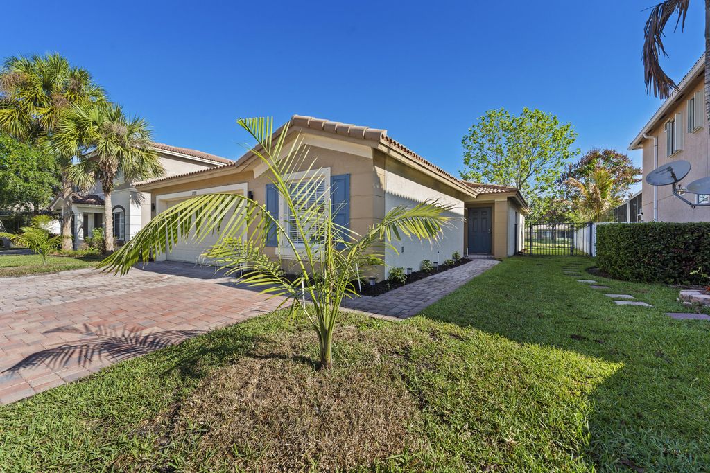 Photo of 1899 Newport Isles Boulevard, Port Saint Lucie, FL 34953 (MLS # B26017984)