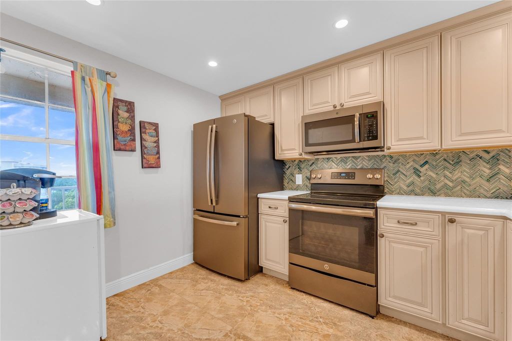 Photo of 3090 N Course Drive #709, Pompano Beach, FL 33069 (MLS # F10507203)