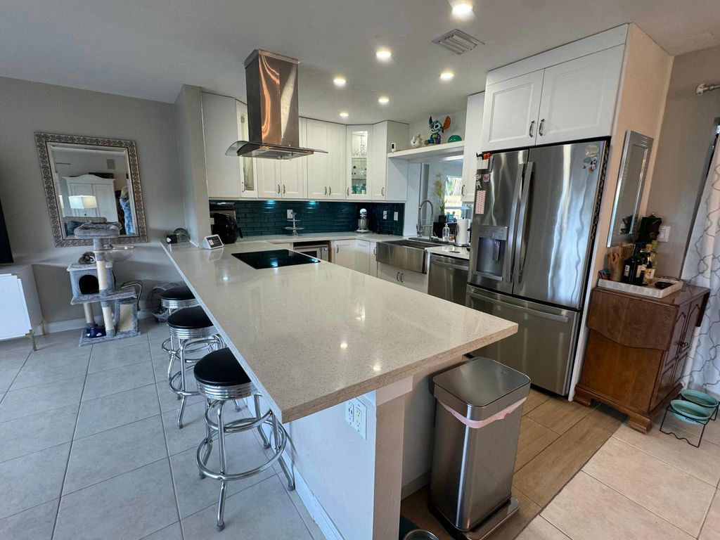 Photo of 2099 S Conference Drive, Boca Raton, FL 33486 (MLS # B26001547)