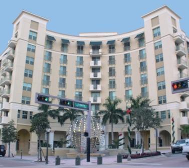 Southern exposure from this 5th floor split bedroom condo with city views! Tiled living area, carpet in bedrooms, open kitchen with granite and stainless, W/D in unit. Ideal in town location on the west end of Clematis - walk to shops, dining, entertainment, waterfront. 610 Clematis offers 24hr front desk, huge salt water pool, hot tub, fitness studio, sauna, steam, and two grilling areas. One assigned parking space in the building garage included. Sorry, no pets.