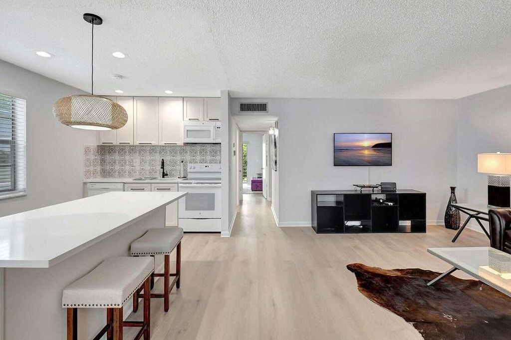 Photo of 74 Normandy B, Delray Beach, FL 33484 (MLS # R11101541)