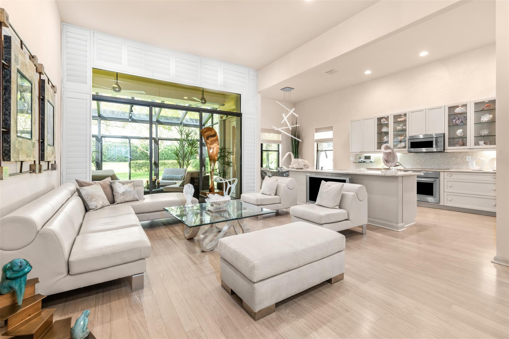 Welcome to your peaceful retreat in the heart of Four Seasons, an exclusive 55+ active community!
Beautifully maintained single-story home features an open-concept layout, highlighted by a grand limestone entry and soothing neutral tones throughout. This home offers comfort and style at every turn. Enjoy entertaining or relaxing in the bright & airy glass-enclosed sunroom. Stunning chef’s kitchen is fully updated with premium Thermador Stainless Steel appliances. Luxurious primary includes a custom-designed en-suite, adding a touch of spa-like serenity to your everyday routine. Numerous upgrades & thoughtful details throughout. Enjoy world class amenities, state-of-the-art fitness center, 24/7 manned gated entrance. Home is just minutes away from Florida Turnpike and Delray Marketplace.