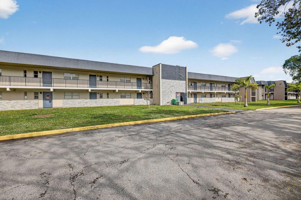 Photo of 7925 Colony Circle S #203, Tamarac, FL 33321 (MLS # R11144697)