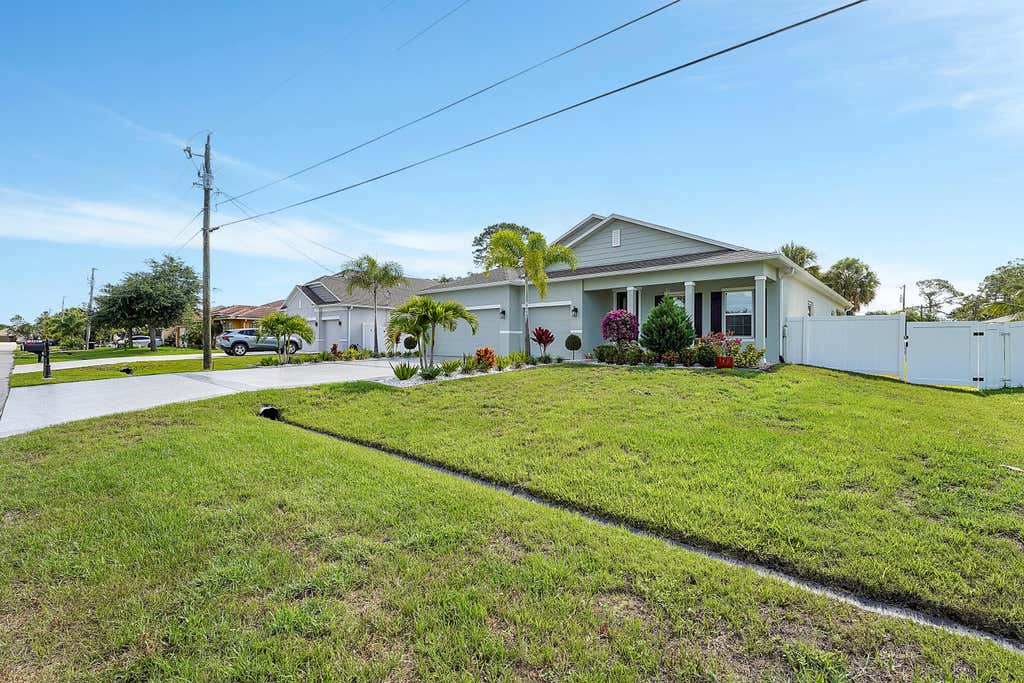 Photo of 2343 SW Madrid Road, Port Saint Lucie, FL 34953 (MLS # R10989891)