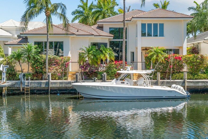 Dock your Mega-Yacht in your Backyard and Live Your Best Life in Boca Marina Yacht Club, an Impeccable Gated Waterfront Neighborhood in East Boca Raton! 659 Boca Marina Court Enjoys 88' of Deepwater Dockage in the Backyard and Features 4 bdrms PLUS a Convertible 5th bdrm, 4 full and 1 half bath with the Primary Bedroom Downstairs with Extraordinary Closet Space & storage and a Sumptuous Master Bath!  This Residence Relishes Southern Exposure that Delivers Natural Light through all main Living spaces! *Brand New* 2022 Roof and Exceptional Interiors with Crème Marfil & Hardwood flooring. Move-in ready!  Boca Marina Yacht Club offers Tennis, Bocce Ball Court, Playground & Resort Style Pool & Spa, a Gorgeous Modern Clubhouse w/ Inviting Outdoor Spaces & 24/7 Manned Security Gate!