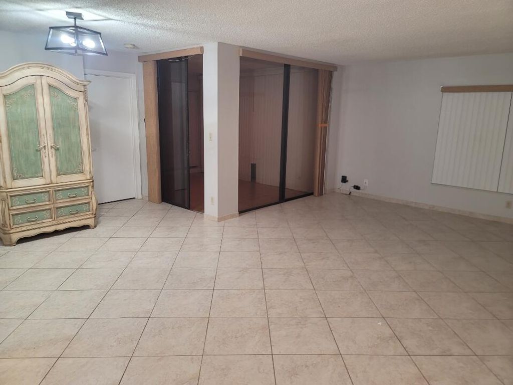 Photo of 8657 W Boca Glades Blvd Boulevard W #C, Boca Raton, FL 33434 (MLS # B26008127)