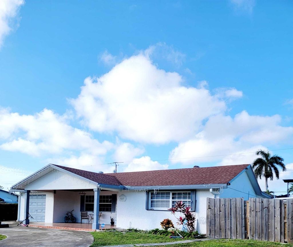 Photo of 4107 Kivey Drive, Lake Worth, FL 33461 (MLS # R10971761)