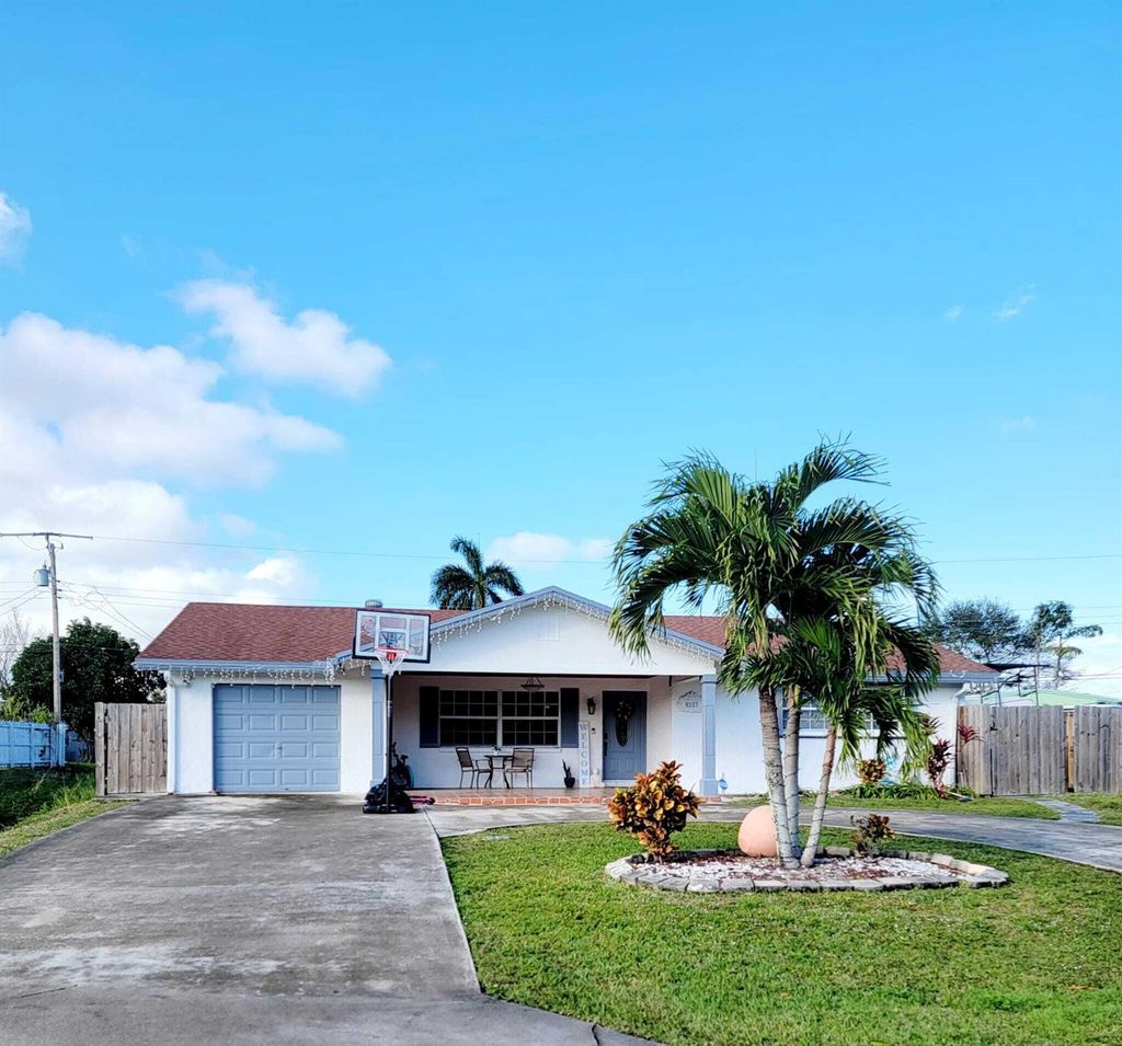 Photo of 4107 Kivey Drive, Lake Worth, FL 33461 (MLS # R10971761)