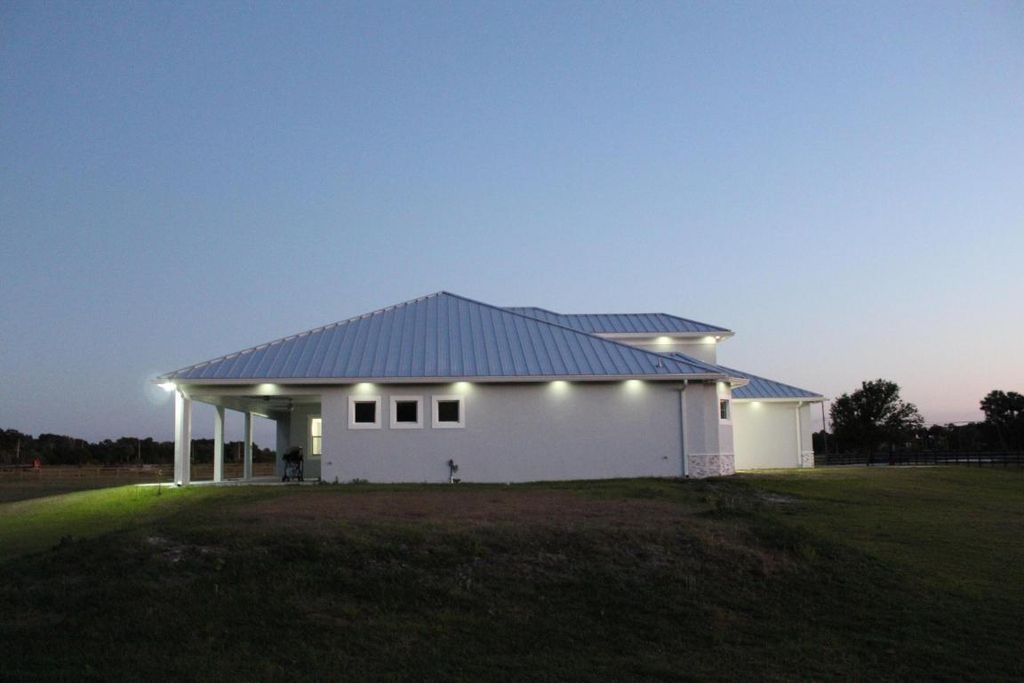 Photo of 3502 S Brocksmith Road, Fort Pierce, FL 34945 (MLS # R11134316)