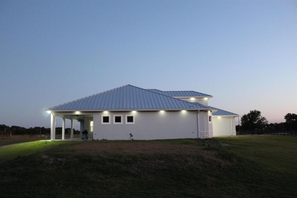 Photo of 3502 S Brocksmith Road, Fort Pierce, FL 34945 (MLS # R11134316)