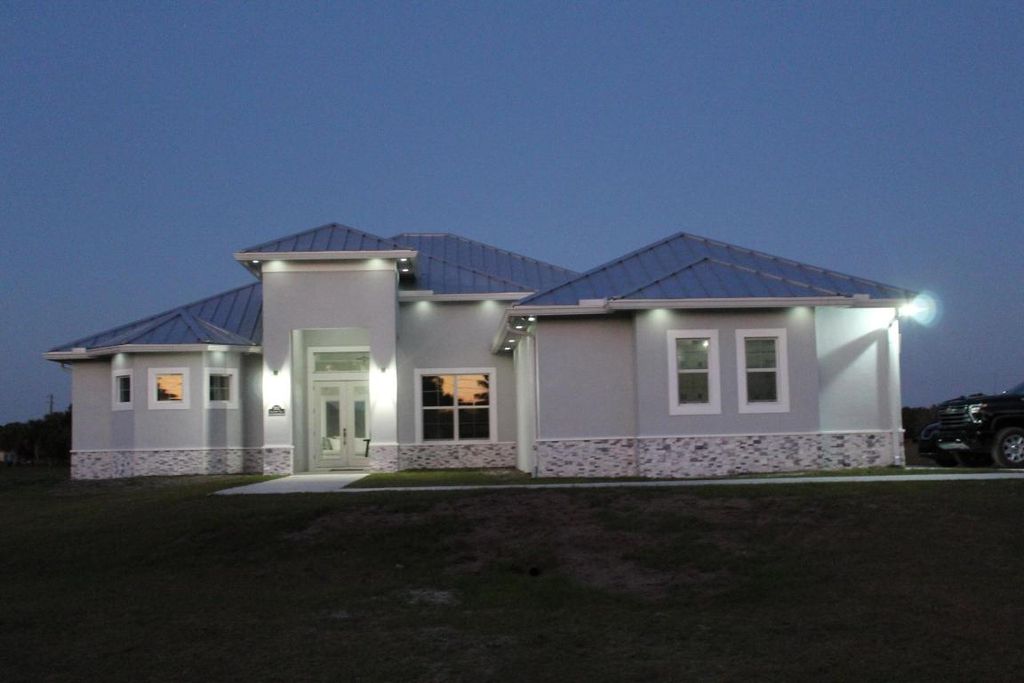 Photo of 3502 S Brocksmith Road, Fort Pierce, FL 34945 (MLS # R11134316)
