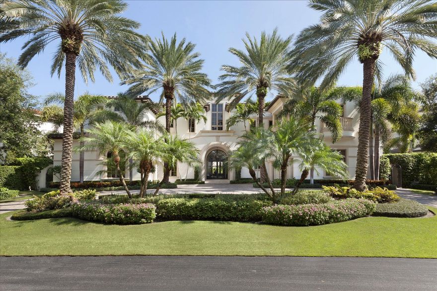 MOTIVATED SELLER - PRICED TO SELLShowing meticulous attention to detail this open floor plan was designed by The Benedict Group.  Comprising 10,282 +/- total square feet, the spacious residence includes 8,543 +/- air-conditioned square feet with 6 bedrooms and 8 1/2 baths.  Features include an elevator and 3-car garage with limousine-depth bay. At the grand arched entry, iron-and-glass double doors open to a raised foyer with patterned marble flooring. Directly ahead is a 2-story rotunda open receiving gallery.  To the left, the formal living room is appointed with rich wood flooring.  Greek key moldings and a Macedonian stone fireplace.  A floor-to-ceiling glass wall overlooks the loggia, pool, and water.