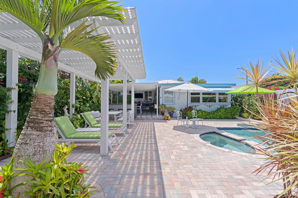 Photo of 430 N Ocean Breeze, Lake Worth Beach, FL 33460 (MLS # R11103080)