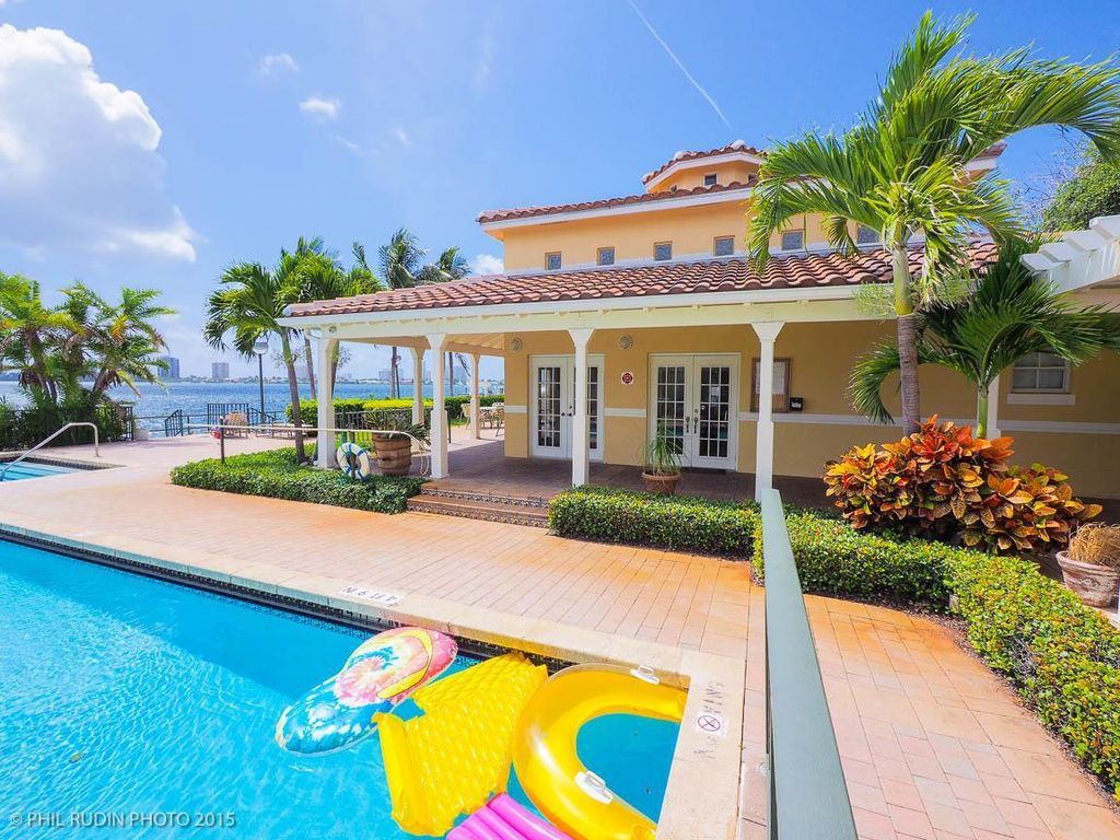 Photo of 1040 Lake Shore 104 Drive #104, Lake Park, FL 33403 (MLS # R11114443)