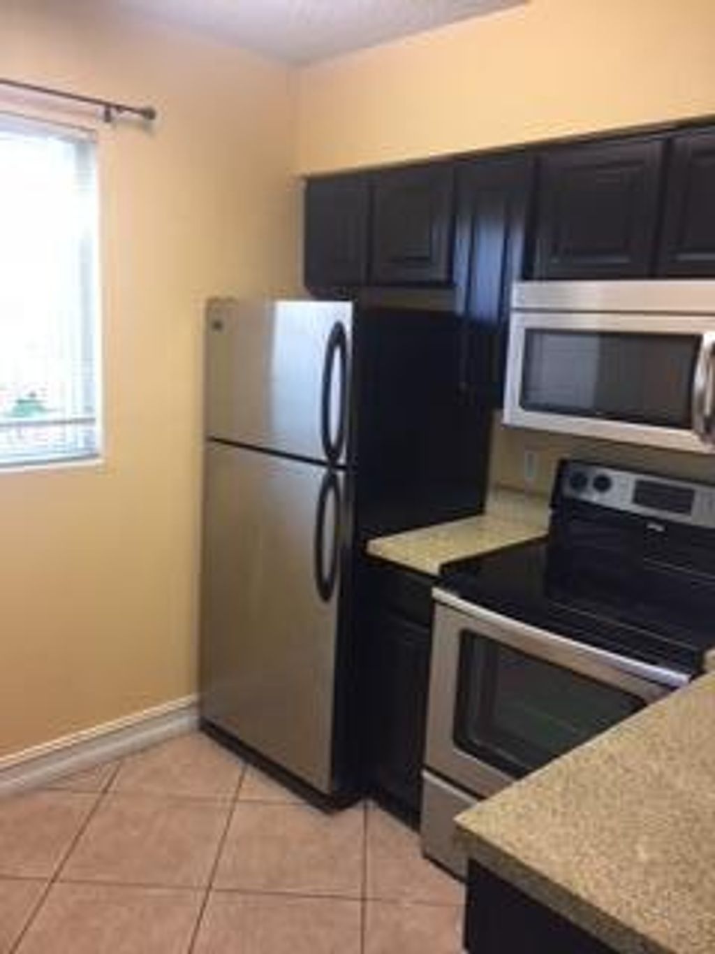 Photo of 1040 Lake Shore 104 Drive #104, Lake Park, FL 33403 (MLS # R11114443)
