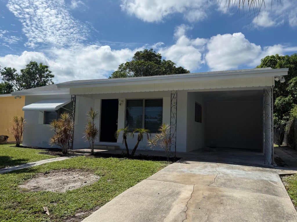 Photo of 817 S B Street, Lake Worth Beach, FL 33460 (MLS # B26087401)