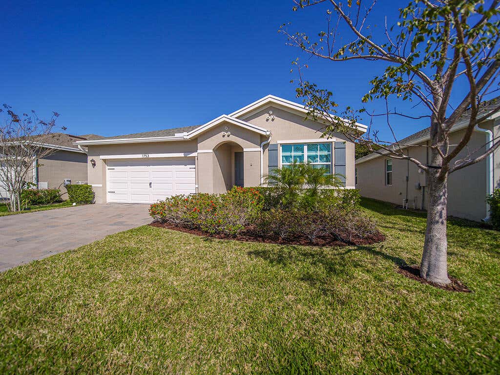 Photo of 1753 NE White Pine Terrace, Jensen Beach, FL 34957 (MLS # R10962036)