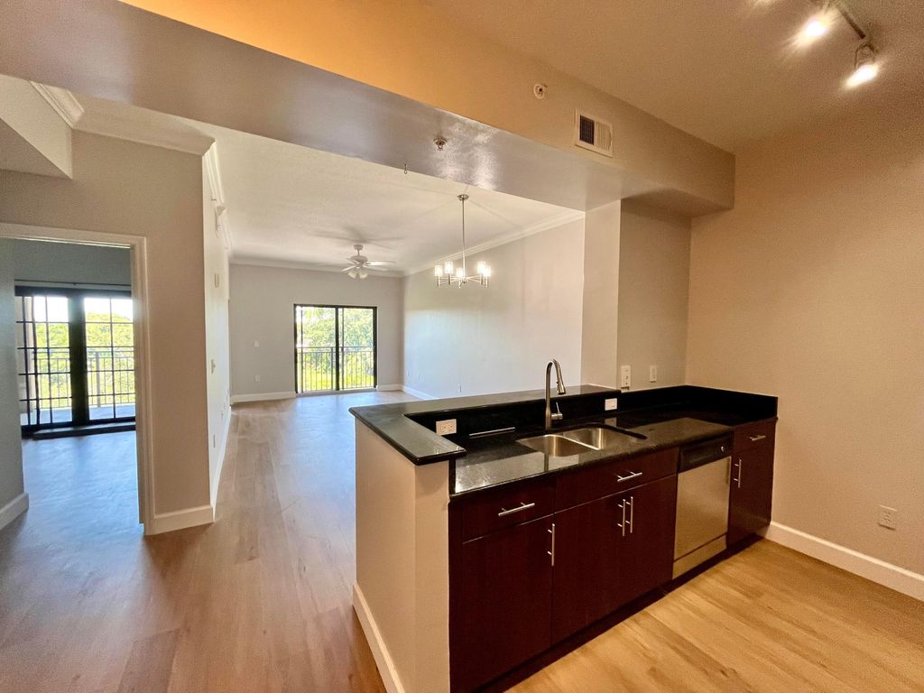 Photo of 4905 Midtown Lane #2411, Palm Beach Gardens, FL 33418 (MLS # R11000225)