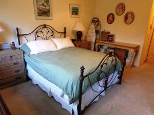 This Condo tucked away in a quiet neighborhood has an oversized screened patio with a lovely water view, roll down hurricane shutters, a large laundry room, formal dining and 2 large bedrooms with walk-in closets. Enjoy all the amenities this community has to offer, tennis courts, pool, workout room, clubhouse, and this building is one of the few with an elevator.